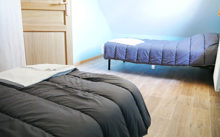 kamer met eenpersoonsbed Bedden Chalet Alsacien Eguisheim