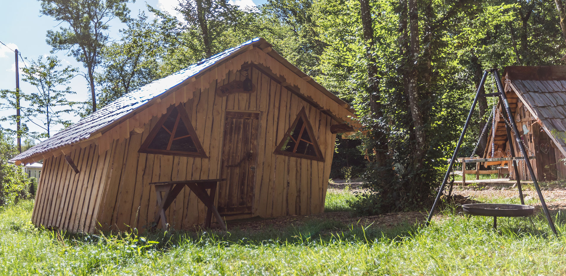 The two bedroom areas of the Wooden Hut of Hansel rental of atypical cabins in Alsace at the Campsite Les Castors